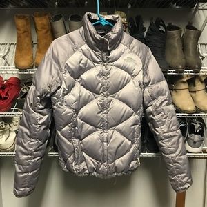 silver metallic north face puffer jacket